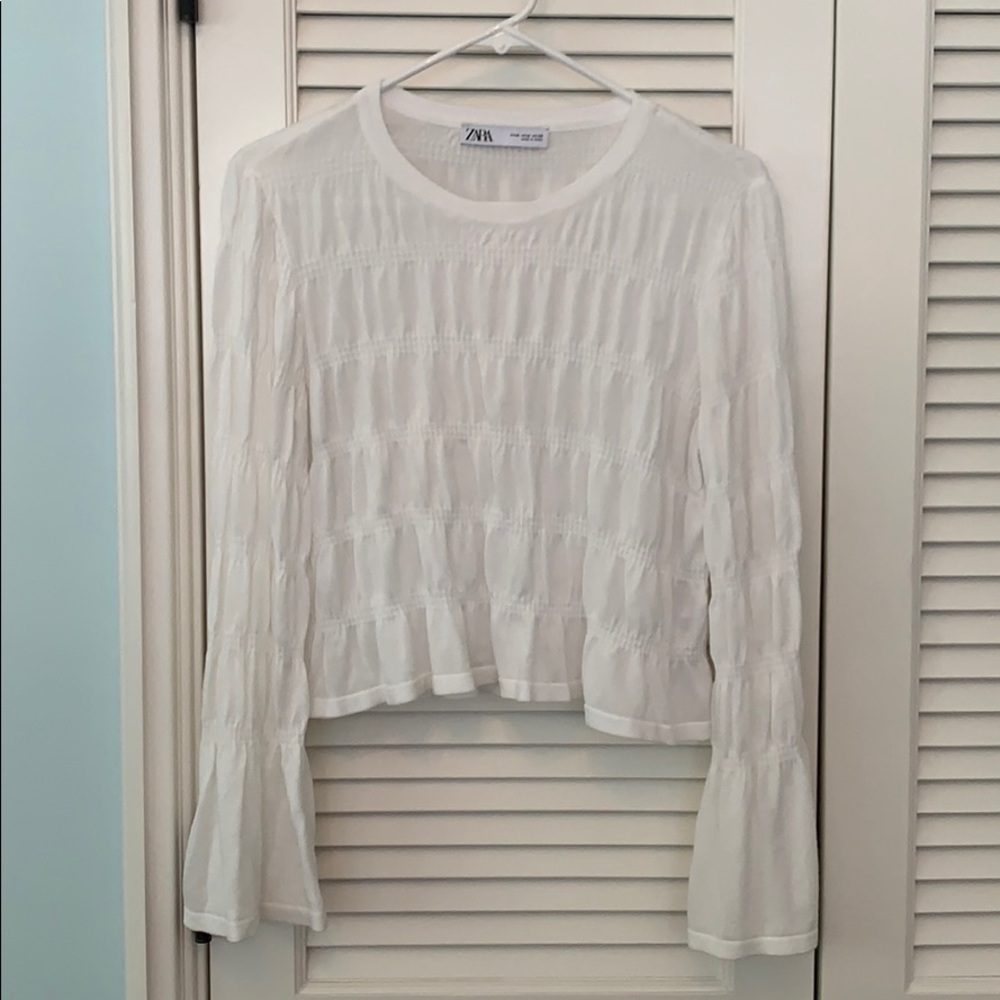 White cropped long sleeve top with bunching detail